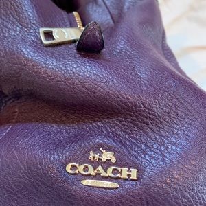 Purple leather coach purse